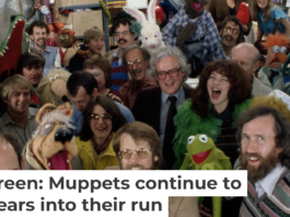 The artists and crew behind the ‘The Muppet Show,’ including Muppet creator Jim Henson, third from right in the front row, gather for the camera. Nancy Moran/Sygma via Getty Images